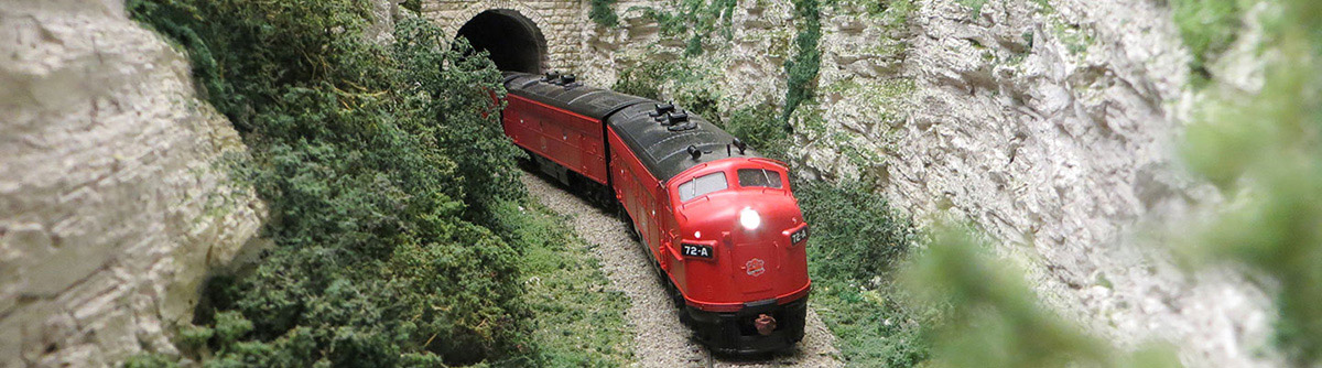 MKT locomotive emerges from tunnel on Steve Nelson's layout